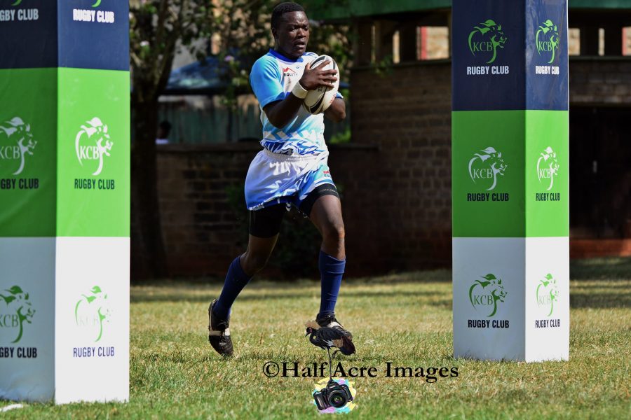 MMUST Lamech Ambetsa races for try against Mwamba. Photo Courtesy/Denis Acre-half.