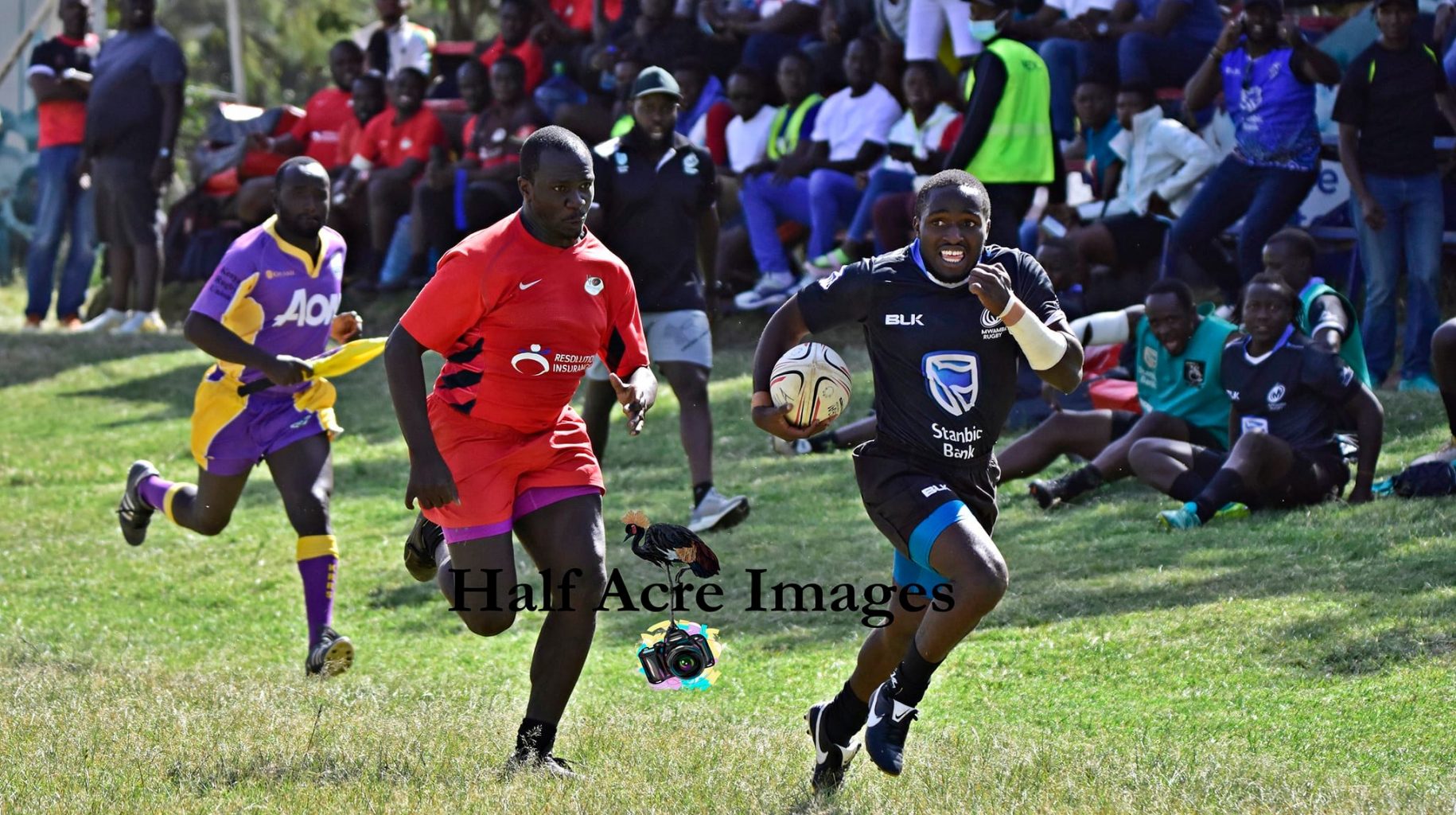 Mwamba Ronnie Omondi races away from Impala's Tony Khadambi. Photo Courtesy/Denis Acre-Half