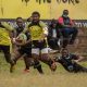 Kabras' Jone Kubu evades Mwamba RFC opponents. Photo Courtesy/Denis Acre-Half.
