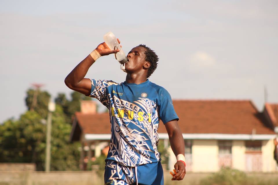 MMUST CENTRE TIMOTHY MMASI QUENCHES THIRST IN A PAST ACTION. PHOTO COURTESY/MMUST.