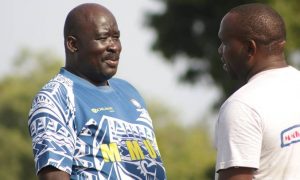 KRU Development Director Dr Ochieng Ahaya and John Asila consult. Photo Courtesy/MMUST.