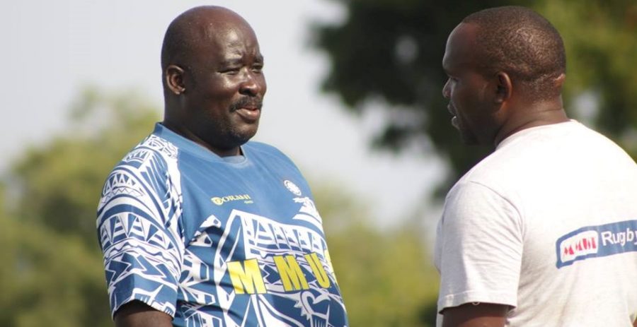 KRU Development Director Dr Ochieng Ahaya and John Asila consult. Photo Courtesy/MMUST.