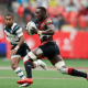 Kenya 7s Kevin Wekesa attacks against the Fiji defense on day one of the HSBC Canada Sevens at BC Place Stadium on 16 April, 2022 in Vancouver, Canada. Photo credit: Mike Lee - KLC fotos for World Rugby