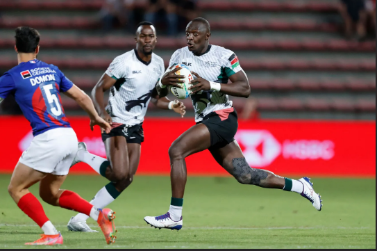 Kenya 7s Collins Shikoli attacks against the France defense on day one of the HSBC France Sevens men's competition at Stade Toulousain on 20 May, 2022 in Toulouse, France. Photo credit: Mike Lee - KLC fotos for World Rugby