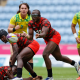 Kenya 7s Willy Ambaka launches an attack against the Australia defense on day two of the Birmingham 2022 Commonwealth Games at Coventry Stadium on 30 July, 2022 in Coventry, England. Photo credit: Mike Lee - KLC fotos for World Rugby