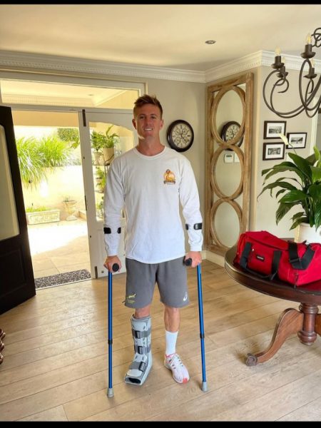 Oscar Dennis with crutches. Photo Courtesy/Instagram