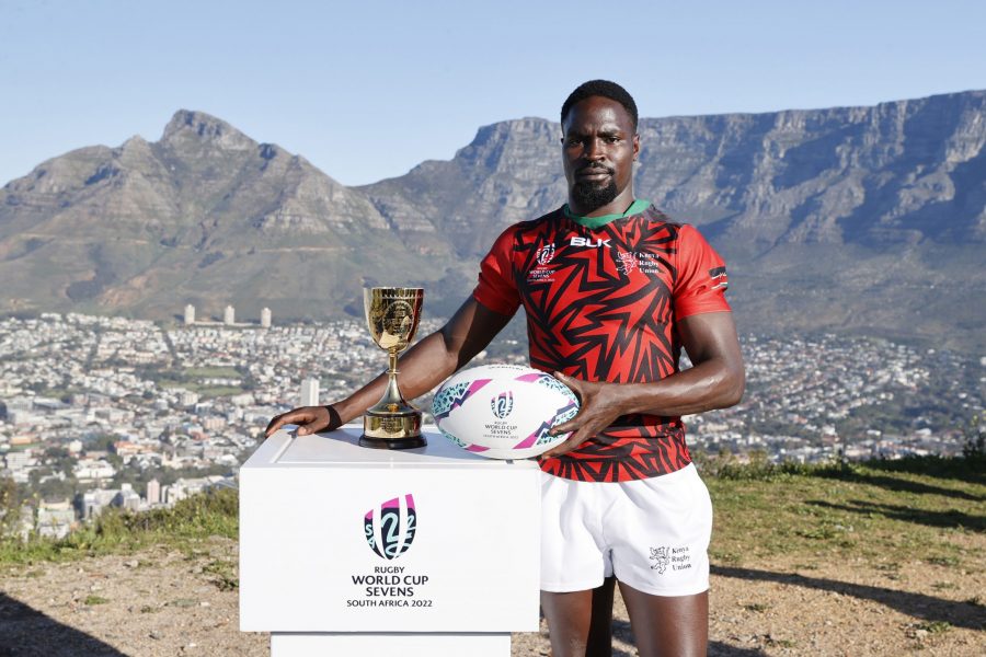 Kenya 7s skipper Nelson Oyoo poses with World Cup trophy. Photo Courtesy/World Rugby