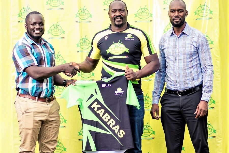Kabras captain Dan Sikuta receives kit from former Kenyan International Nick Barasa. Photo Courtesy/Dave Mwaur a/Scrummage Africa