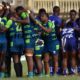 KCB Rugby huddle in a past action. Photo CourtesyDennis Acre-half.