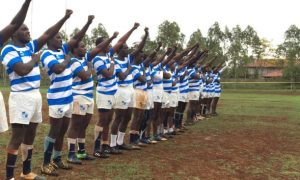 Mean machine p[layers sing the anthem. Photo Courtesy/Mean Machine.