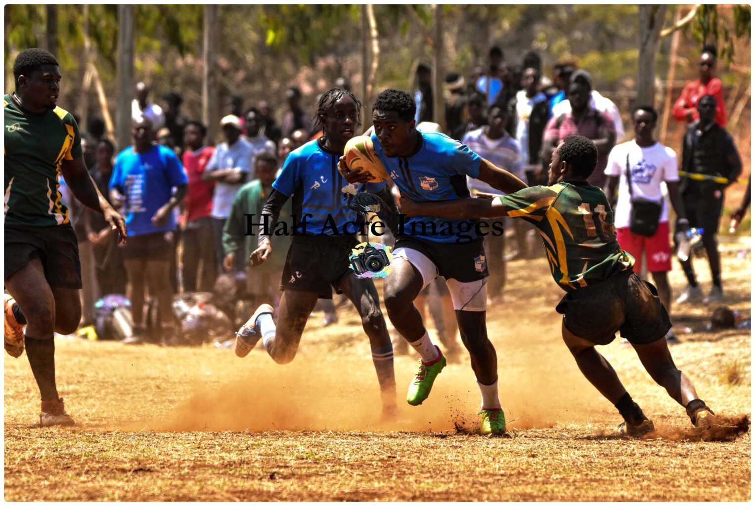A varsity league match on a dusty surface, Photo Courtesy/Denis Acre-half.