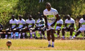 KCB's Darwin Mukidza kicks agaisnt Mwamba. Photo Courtesy/Denis Acre-hALF