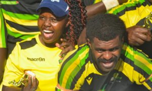 Redemptor Chepwogen celebrates with Kabras RFC players after Kenya Cup win. Photo Courtesy/Davelense.