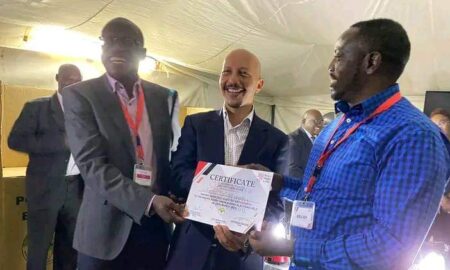 Alex Mutai receives certificate after KRU elections. Photo Courtesy/