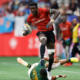 Kenya 7s George Ooro Angeyo breaks through the South Africa defense on day two of the HSBC Canada Sevens at BC Place Stadium on 4 March, 2023 in Vancouver, Canada. Photo credit: Mike Lee - KLC fotos for World Rugby