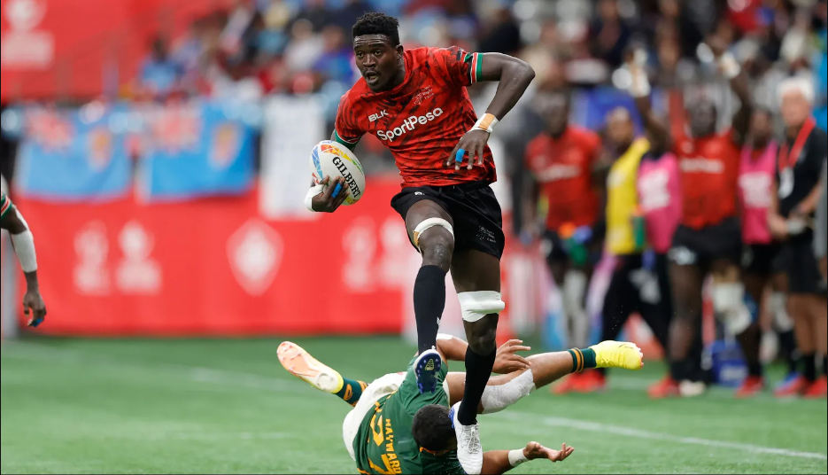 Kenya 7s George Ooro Angeyo breaks through the South Africa defense on day two of the HSBC Canada Sevens at BC Place Stadium on 4 March, 2023 in Vancouver, Canada. Photo credit: Mike Lee - KLC fotos for World Rugby