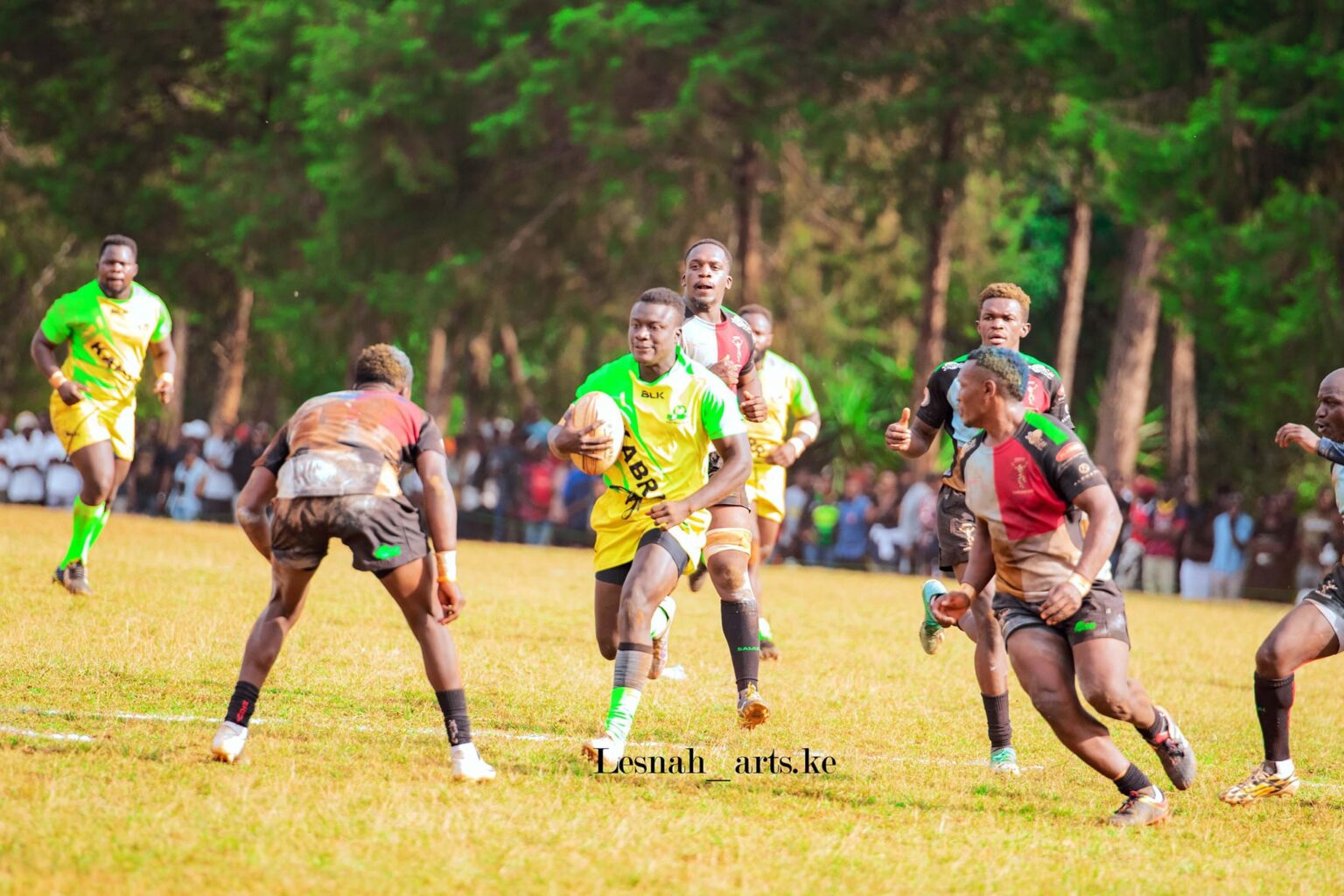 Kabras Dan Angwech  races away from Quins defence, Photo Courtesy/ Lesnsah Image.