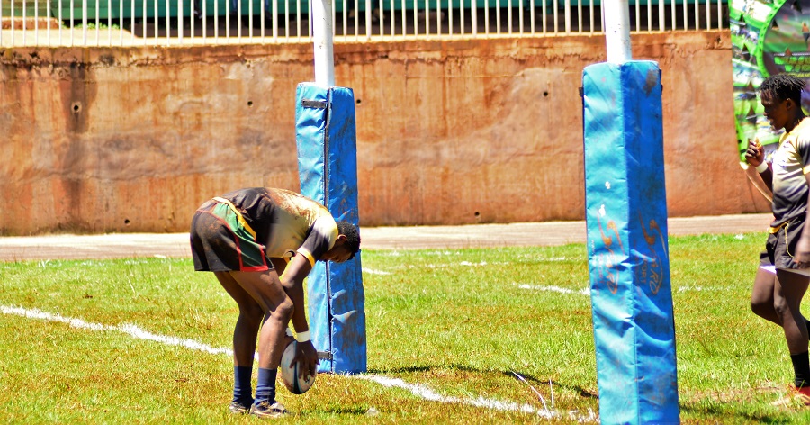 Felix Okoth crosses over for a try for Rugby on the road. Photo Courtesy/Scrummage.