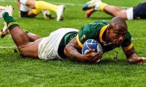 Makazole Mapimpi of South Africa scores his team's second try during the Rugby World Cup France 2023 match between South Africa and Romania at Nouveau Stade de Bordeaux on September 17, 2023 in Bordeaux, France. (Photo by Jan Kruger/Getty Images