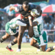 Uganda 7S player tackled by Zimbabwe Cheetahs duo. PHOTO/Uganda rugby Union