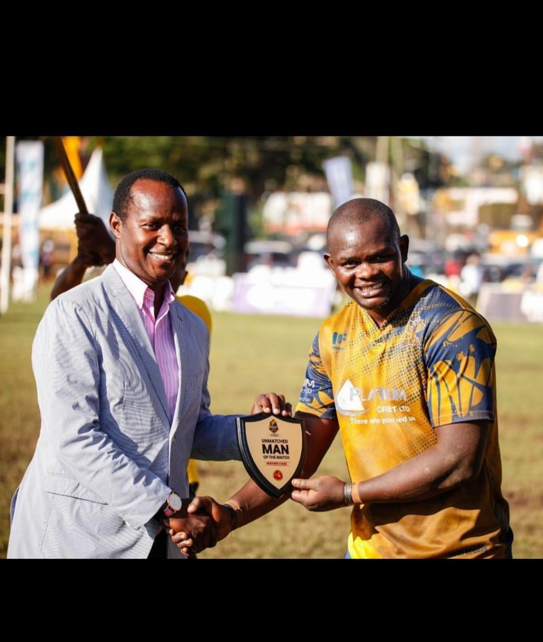 Shadon Munoko receives an award in Uganda. PHOTO/URU