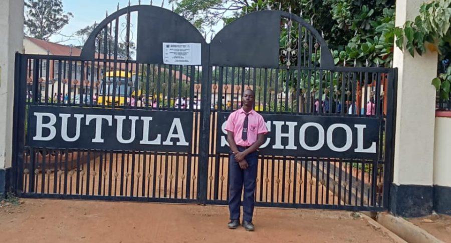 Jake Philimon poses for a photo at the Butula School gate. PHOTO/Libondo Shimenga