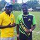 Rayvonne Ambale Olindi with Kabras RFC coach Edwin Achayo. PHOTO/Kabras RFC