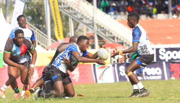 MMUST Rugby's Cyprian Ombaso receives an offload against kenya Harlequin. PHOTO/Brian Mwenje