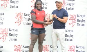 Kenya Lionesses Stella Wafula receieves PoTM award against Madagascar. PHOTO/Mahlon Lichuma