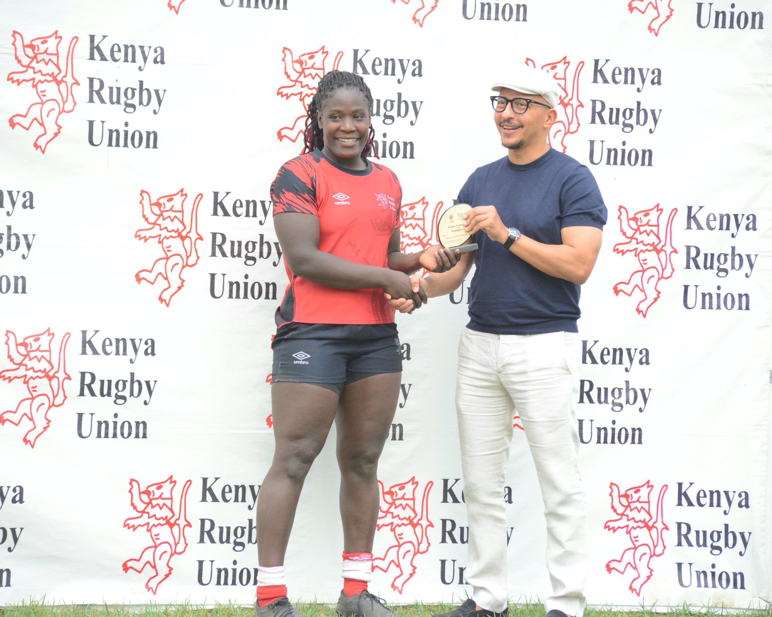 Kenya Lionesses Stella Wafula receieves PoTM award against Madagascar. PHOTO/Mahlon Lichuma