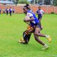 Kisii RFC Victory Gichana dodges tackle against Kisii Polytechnic/ photo: Zapper Images