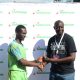 Menengai Oilers Brian Achacha receives Varsity Category award at Impala Floodlit. PHOTO/Scrummage Africa