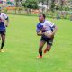 Kisii RFC Frank Mulesi with ball supported by Clifford Nyabwari against Kisii Polytechnic: Photo by Zapper Images