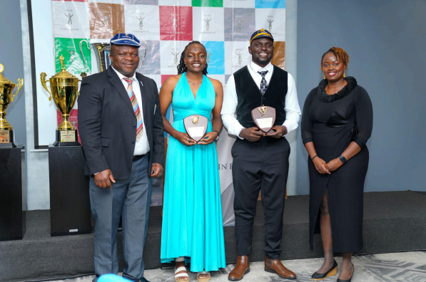 Kenya Harlequins FC Queens captain Sandra Oduor (2nd left) and Kenya Harlequins FC club captain Herman Humwa (3rd left) receive their Captain’s Shields from Chairman Victor Sudi (far left) and Hon Treasurer Peris Mukoko-Wanyaga (far right) at the Kenya Harlequin FC 2024 Annual Dinner and Awards Night held on December 7, 2024 at the Novotel Nairobi. PHOTO: Kenya Harlequin/ Tony Munge