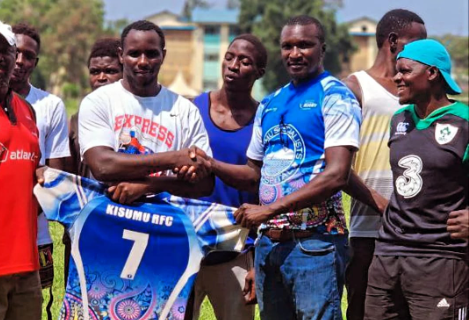 Gibson Perez receives Kisumu RFC kit. PHOTO/ Kisumu RFC