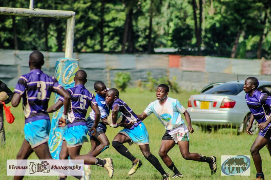 Victor Wawire takes a tackle against St Anthony Kitale. PHOTO/Vicmass