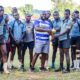 Senende receive Black Rock 7s trophy. PHOTO/Brian Mwenje