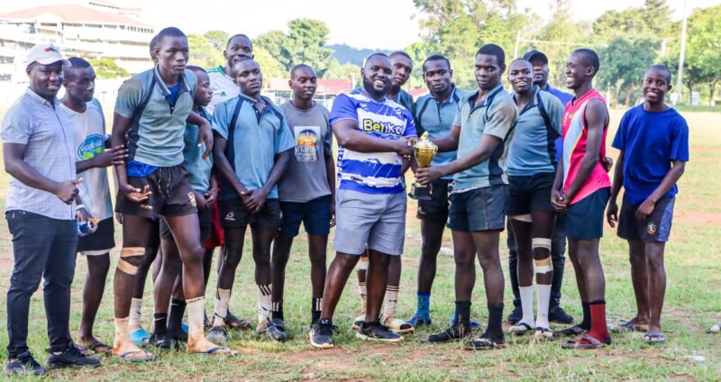 Senende receive Black Rock 7s trophy. PHOTO/Brian Mwenje
