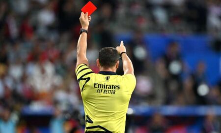 Referee Karl Dickson presents a red card during the Rugby World Cup France 2023. PHOTO/AFP