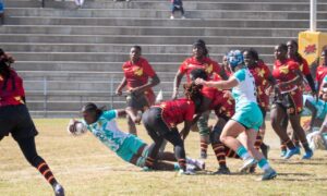 South Africa's Faith Tshauke goes over for her first Test try against Uganda. PHOTO/COURTESY