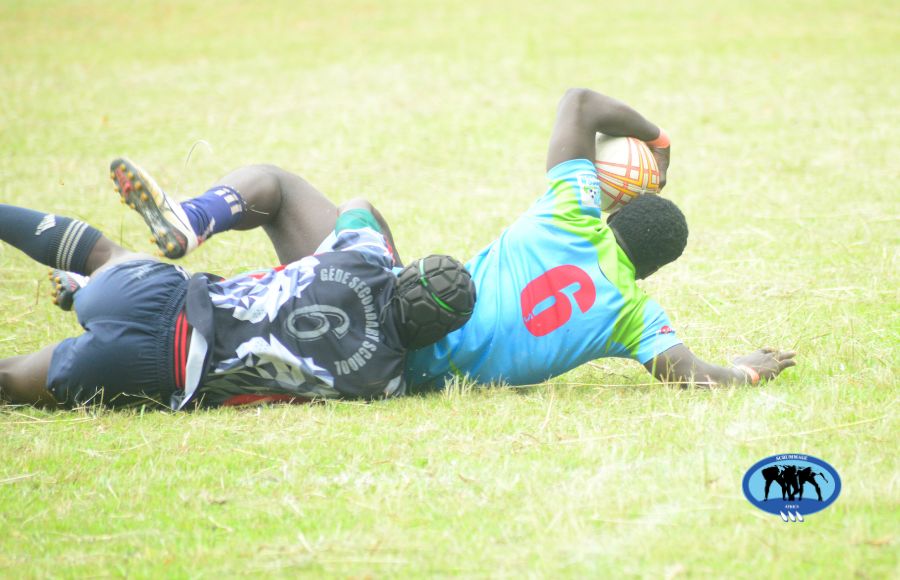 Laiser Hill player tackled by Gede player in the KSSSA National 7s. PHOTO/Purity Kemunto