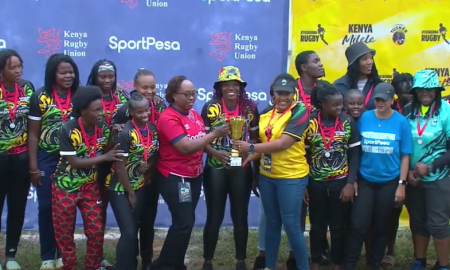 Mwamba RFC ladies receive trophy. PHOTO/KRU