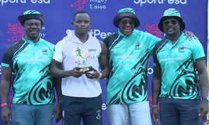 Strathmore Leos Victor Mola Odhiambo receiving the award. PHOTO/ Screengrab