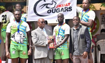 JKUAT Cougars squad handing over trophy. PHOTO/JKUAT Cougars