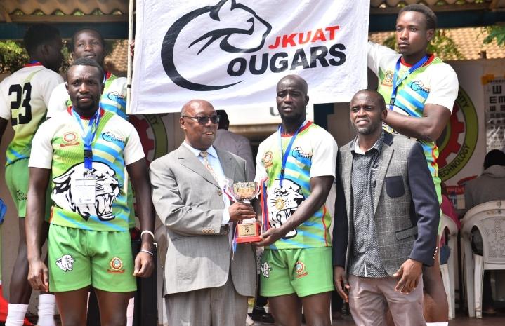 JKUAT Cougars squad handing over trophy. PHOTO/JKUAT Cougars