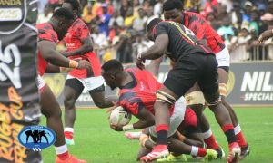 Kenya Simbas Bethuel Anami tackled by Uganda in Rugby Africa Cup.PHOTO/Scrummage Africa