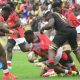 Kenya Simbas Bethuel Anami tackled by Uganda in Rugby Africa Cup.PHOTO/Scrummage Africa